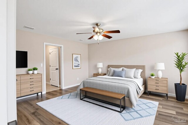 6459 E Quarry Dr, Elberta, AL 36530 - bedroom featuring wood finished floors, baseboards, and ceiling fan