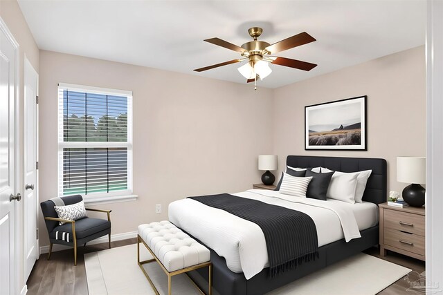 6459 E Quarry Dr, Elberta, AL 36530 - bedroom featuring wood finished floors, baseboards, and a ceiling fan