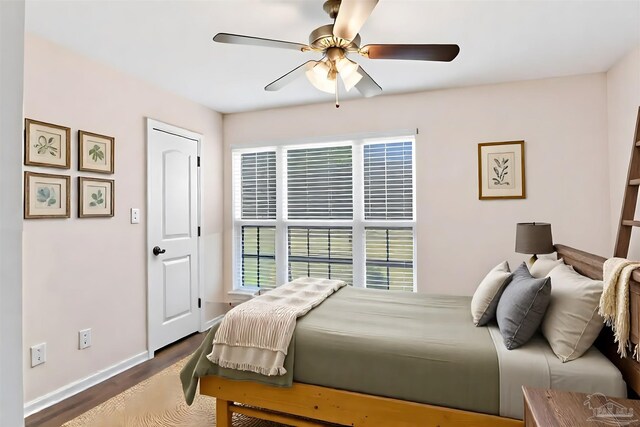 6459 E Quarry Dr, Elberta, AL 36530 - bedroom with baseboards, dark wood-type flooring, and ceiling fan