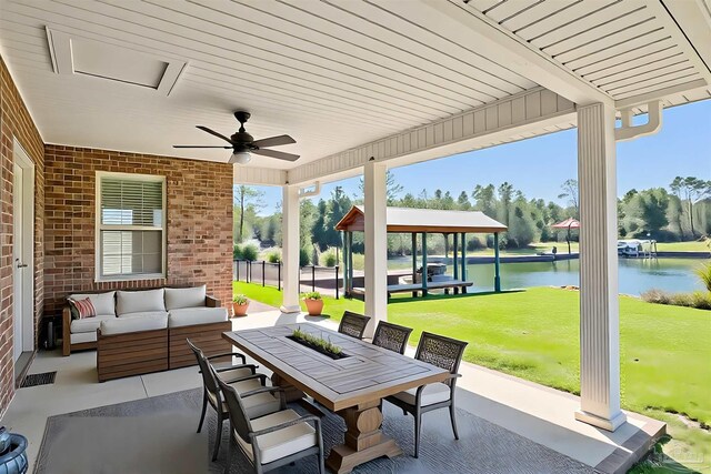 6459 E Quarry Dr, Elberta, AL 36530 - view of patio with a water view, an outdoor hangout area, a ceiling fan, outdoor dining space, and a gazebo