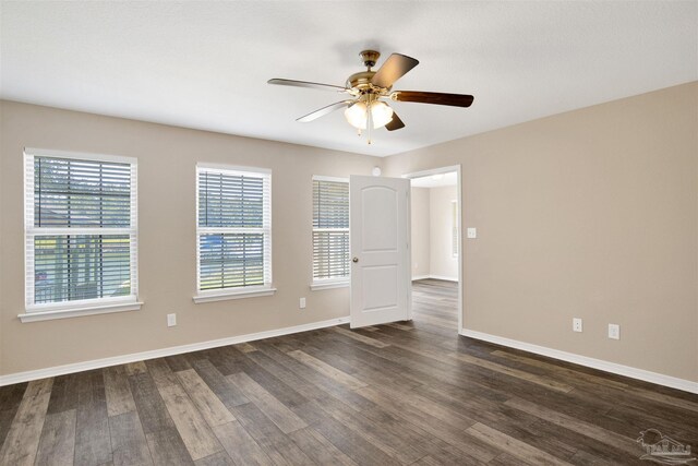 6459 E Quarry Dr, Elberta, AL 36530 - empty room with ceiling fan, dark wood-style floors, and baseboards