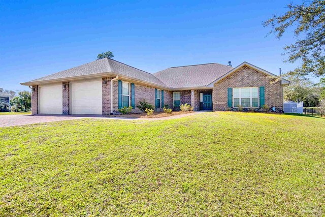 6459 E Quarry Dr, Elberta, AL 36530 - view of front of home featuring brick siding, a garage, driveway, and a shingled roof