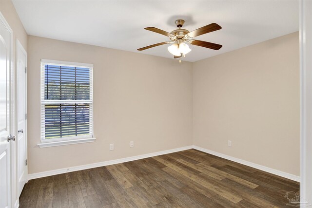 6459 E Quarry Dr, Elberta, AL 36530 - spare room with dark wood-style floors, baseboards, and a ceiling fan