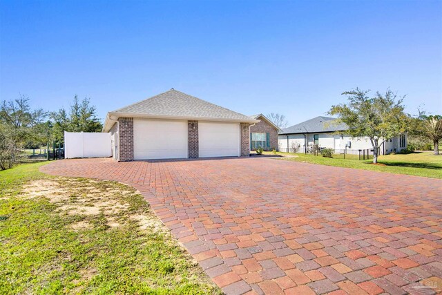 6459 E Quarry Dr, Elberta, AL 36530 - view of front of home featuring a garage, driveway, and brick siding