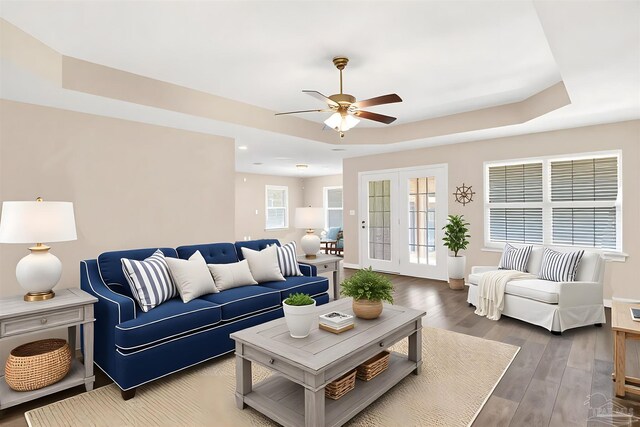 6459 E Quarry Dr, Elberta, AL 36530 - living room with ceiling fan, a tray ceiling, wood finished floors, recessed lighting, and baseboards