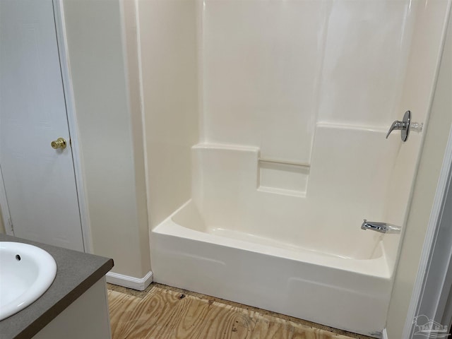 bathroom featuring vanity and shower / washtub combination