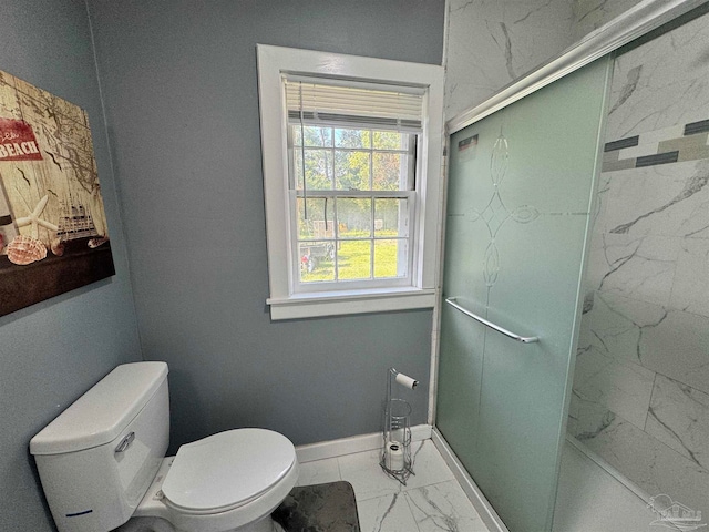 bathroom with toilet, tile patterned floors, and a shower with door