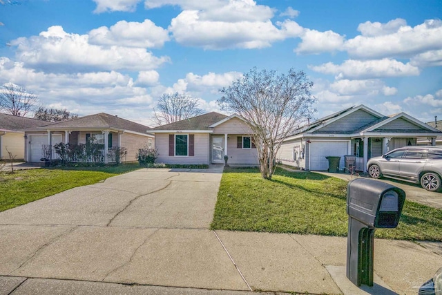 ranch-style home with an attached garage, driveway, and a front yard