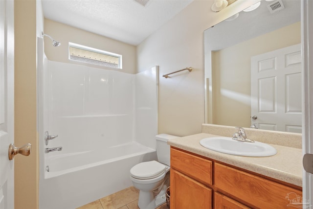 full bathroom featuring toilet, vanity, visible vents,  shower combination, and tile patterned floors