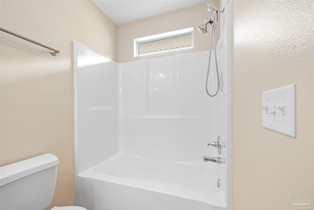 full bathroom with shower / washtub combination and toilet