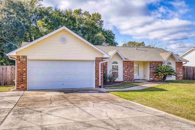 single story home featuring a garage and a front lawn