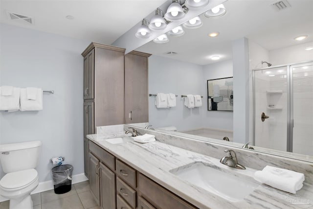26688 Perdido Beach Blvd Unit 1605, Orange Beach, AL 36561 - bathroom featuring toilet, a shower stall, double vanity, tile patterned floors, and baseboards