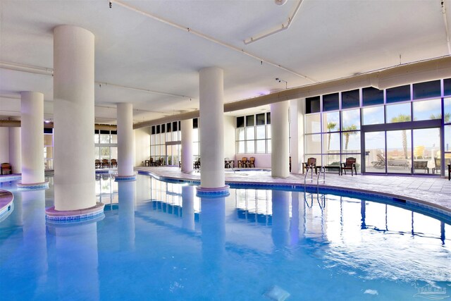 26688 Perdido Beach Blvd Unit 1605, Orange Beach, AL 36561 - indoor community pool with a bar and a patio area