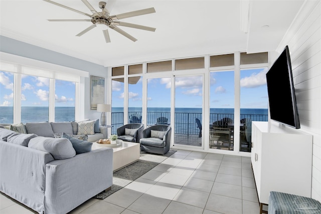 26688 Perdido Beach Blvd Unit 1605, Orange Beach, AL 36561 - living area with a water view, light tile patterned floors, a ceiling fan, and crown molding
