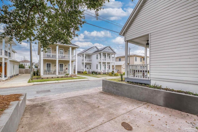 exterior space with a residential view and fence