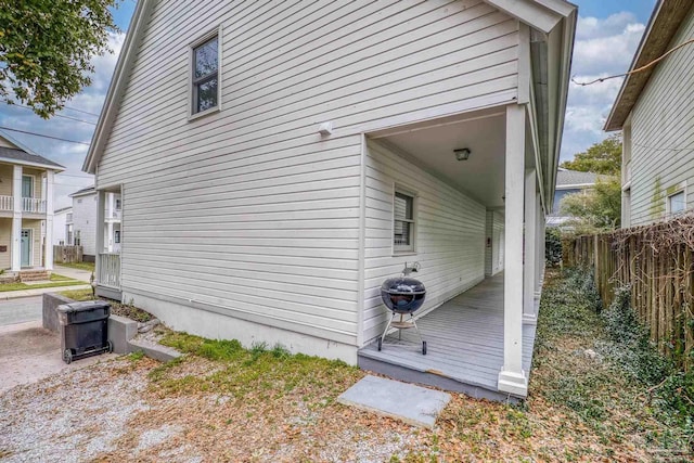 view of side of property with fence