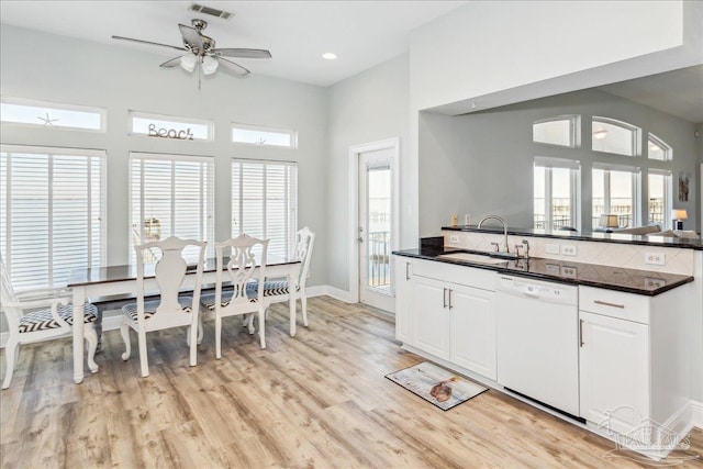 kitchen with sink, white cabinetry, white dishwasher, ceiling fan, and light hardwood / wood-style floors