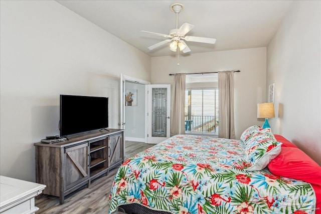 bedroom featuring hardwood / wood-style floors and ceiling fan