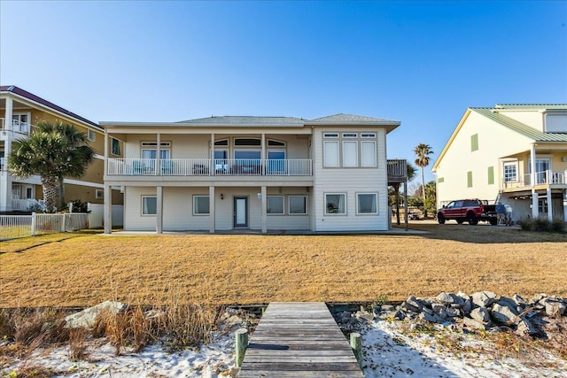 rear view of house with a balcony