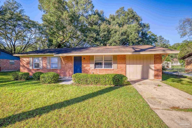 ranch-style home with a front yard