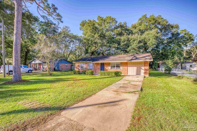 single story home featuring a front lawn