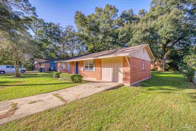 ranch-style home with a front lawn