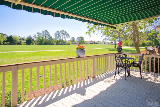 1424 Champions Green Dr, Gulf Breeze, FL 32563 - wooden terrace with a lawn