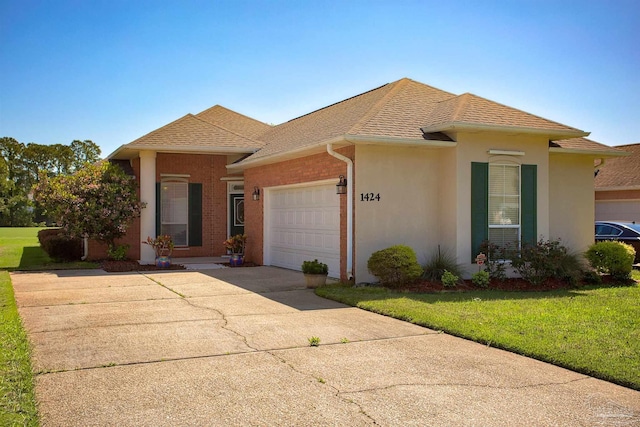 1424 Champions Green Dr, Gulf Breeze, FL 32563 - view of front facade featuring roof with shingles, an attached garage, a front lawn, and concrete driveway