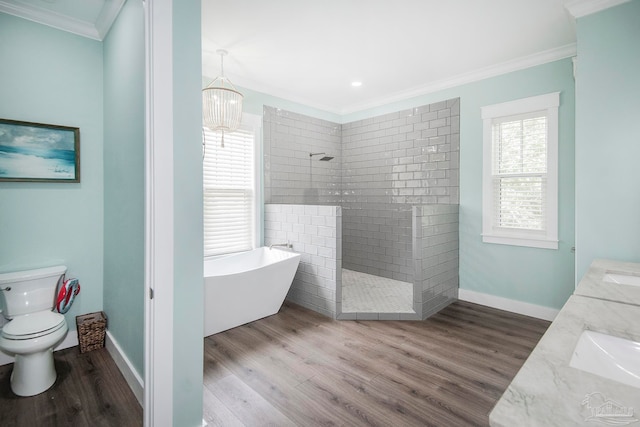 full bathroom with vanity, plus walk in shower, toilet, ornamental molding, and wood-type flooring