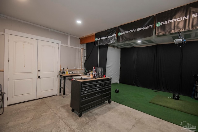 basement featuring golf simulator