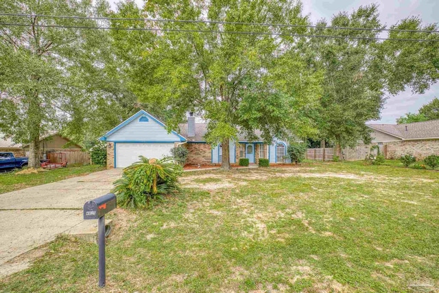 obstructed view of property with a front yard