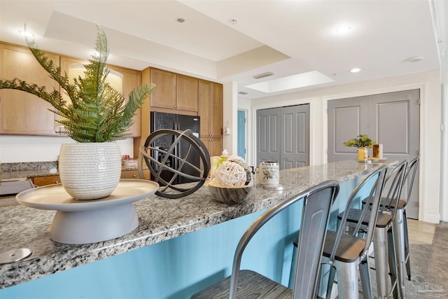 kitchen with stone counters