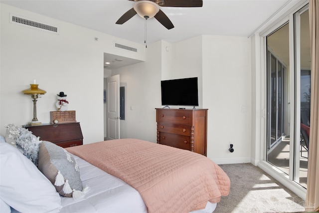 carpeted bedroom featuring access to outside and ceiling fan