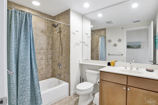 full bathroom featuring shower / bathtub combination with curtain, vanity, toilet, and tile patterned flooring