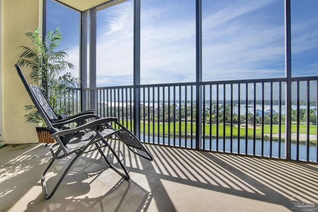 sunroom with a water view