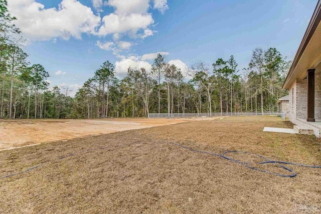 view of yard with fence