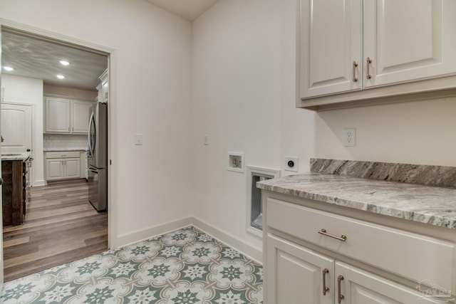 laundry room with washer hookup, baseboards, hookup for an electric dryer, and recessed lighting