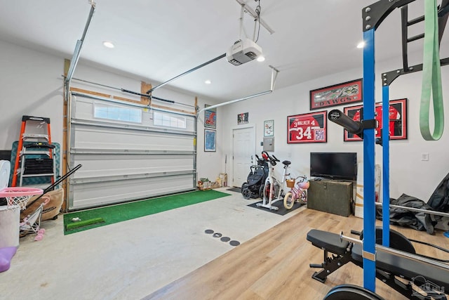 garage featuring a garage door opener