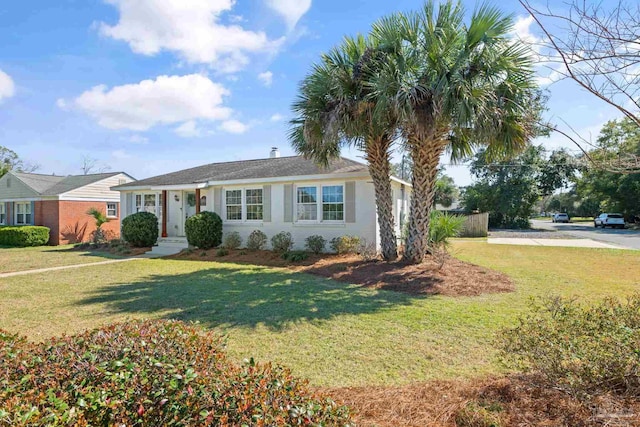 single story home with a front yard