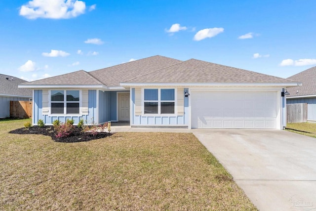 ranch-style house featuring a garage, concrete driveway, fence, board and batten siding, and a front yard