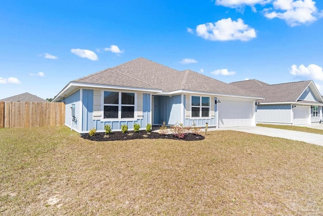 single story home with a garage, concrete driveway, fence, board and batten siding, and a front yard