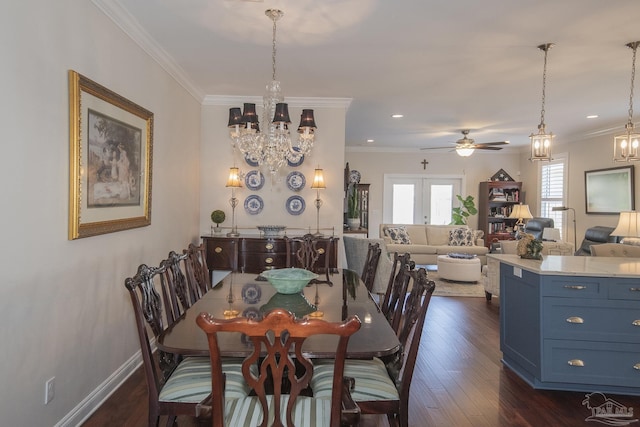 dining space featuring recessed lighting, ceiling fan with notable chandelier, dark wood-type flooring, baseboards, and crown molding