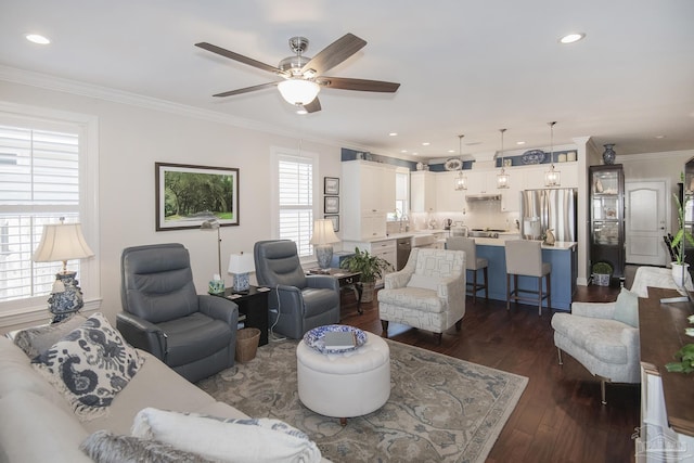 living area with dark wood-style floors, ceiling fan, recessed lighting, and crown molding