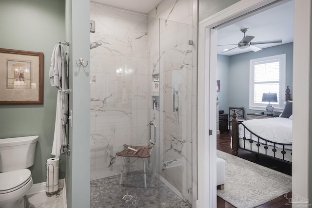 bathroom featuring a marble finish shower, a ceiling fan, connected bathroom, toilet, and marble finish floor