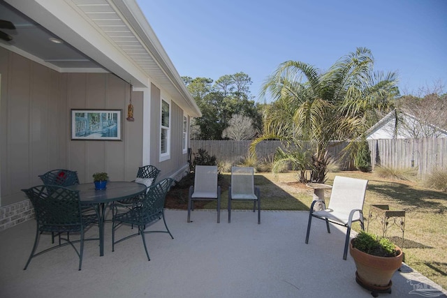 view of patio / terrace with a fenced backyard and outdoor dining area