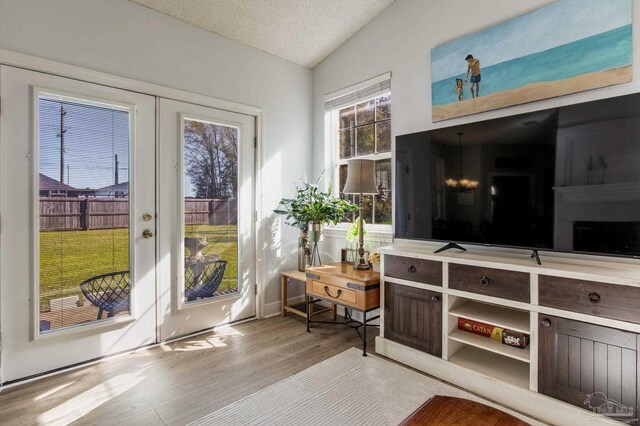 9348 Bell Ridge Dr, Pensacola, FL 32526 - interior space featuring french doors, vaulted ceiling, and wood finished floors
