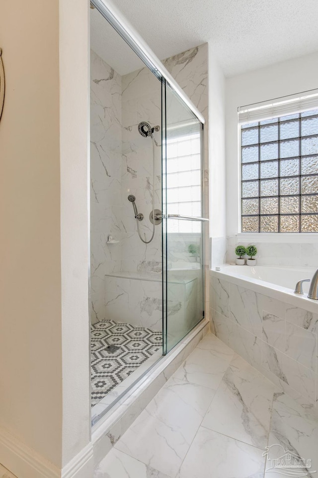 9348 Bell Ridge Dr, Pensacola, FL 32526 - full bath featuring a healthy amount of sunlight, a marble finish shower, and a garden tub