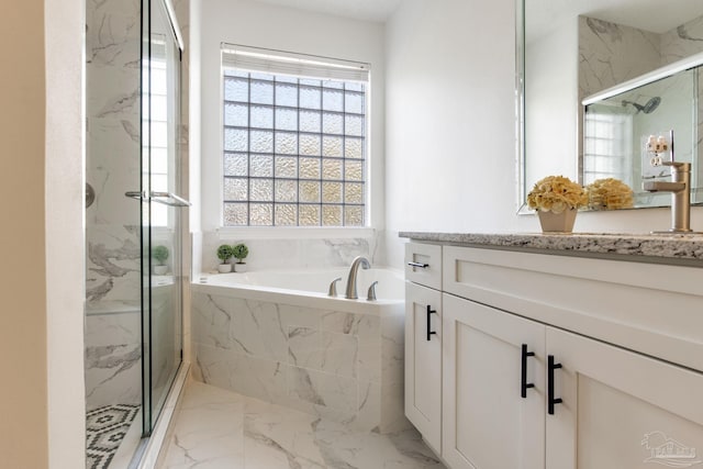 9348 Bell Ridge Dr, Pensacola, FL 32526 - bathroom featuring marble finish floor, a bath, a marble finish shower, and a wealth of natural light