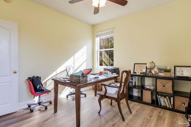 9348 Bell Ridge Dr, Pensacola, FL 32526 - office with baseboards, ceiling fan, and wood finished floors