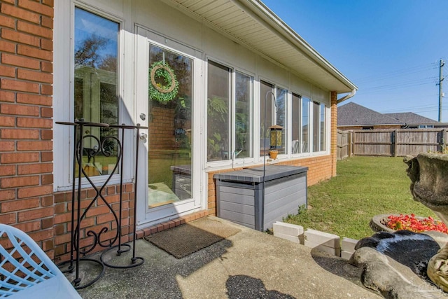 9348 Bell Ridge Dr, Pensacola, FL 32526 - exterior space with brick siding, fence, and a yard